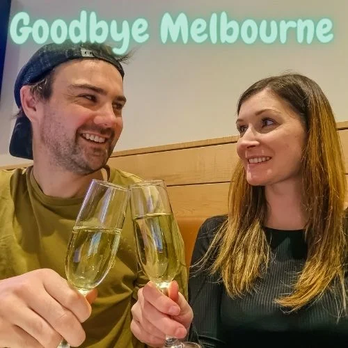 A couple enjoying a glass of champagne at the Qantas lounge