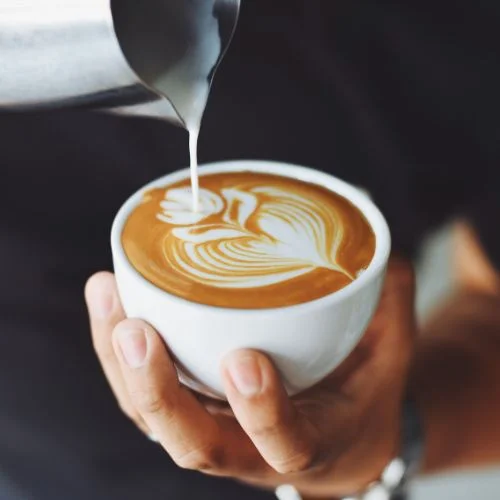 coffee being poured by barista