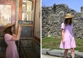 A lady in a pink dress exploring Pompeii, Italy