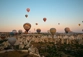 Hot air balloons over the Cappadocia valley in Turkey