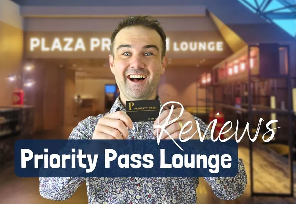 Man standing with a priority pass used to access lounges