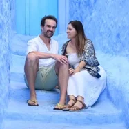 couple sitting in Blue City, Morocco